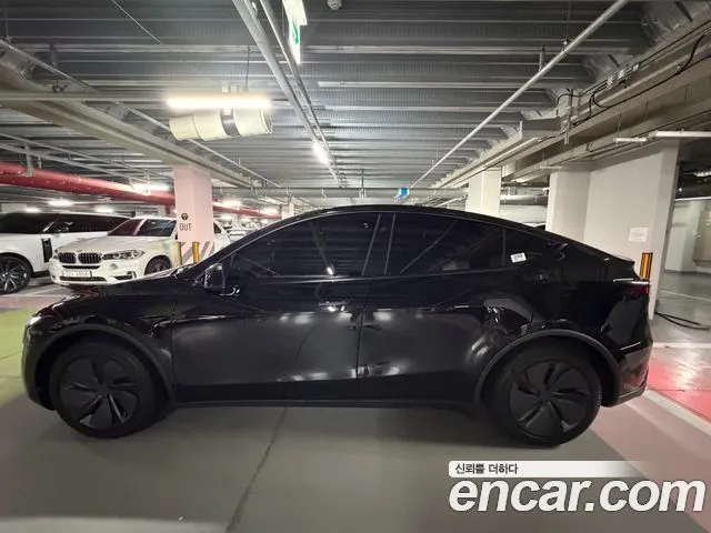 Tesla Model Y — фото 9