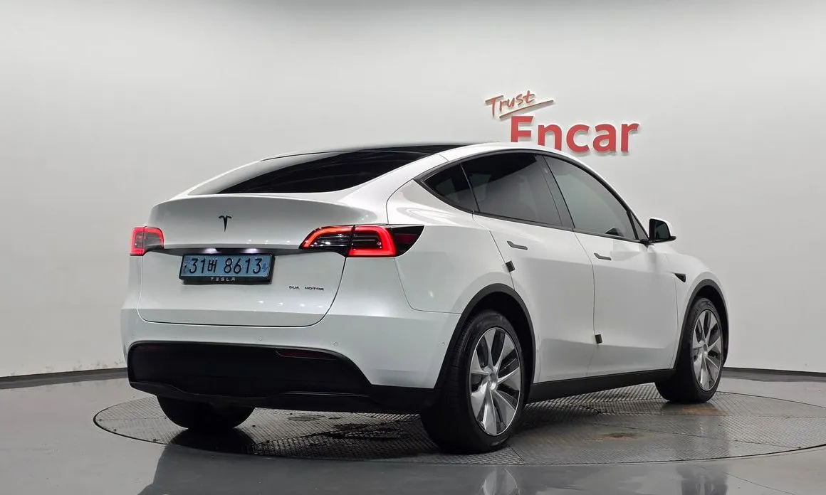Tesla Model Y — фото 6