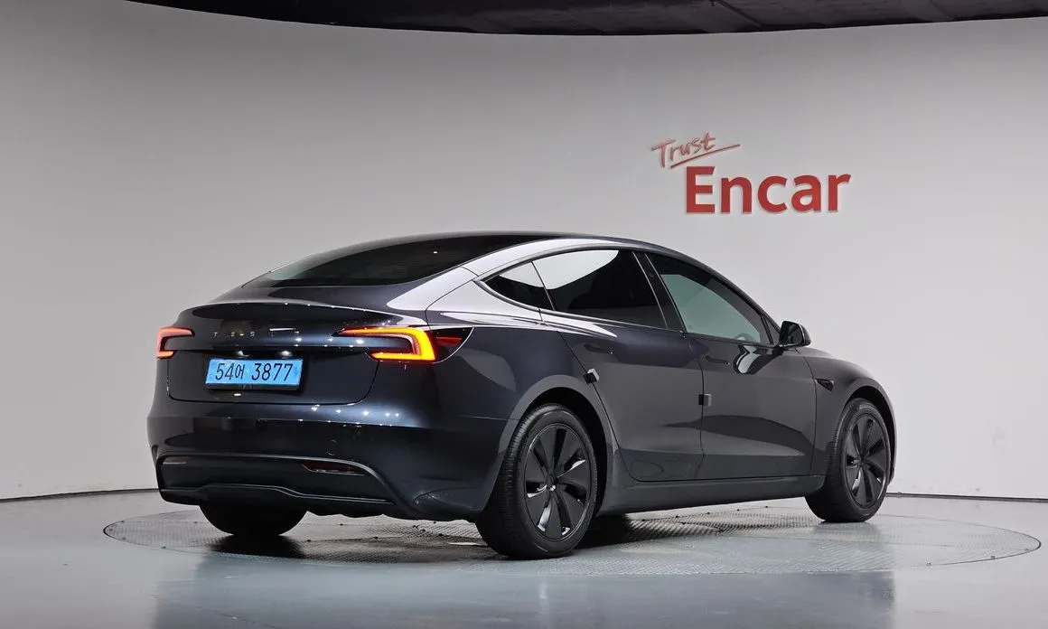 Tesla Model 3 — фото 7