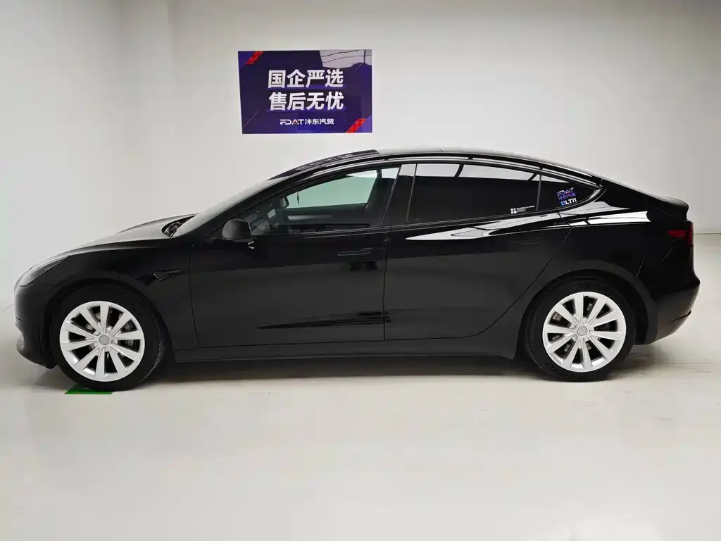 Tesla Model 3 — фото 10