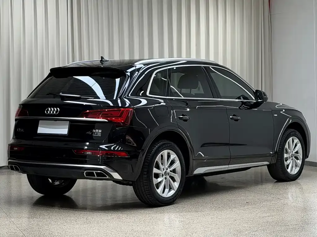 Audi Q5L — фото 6