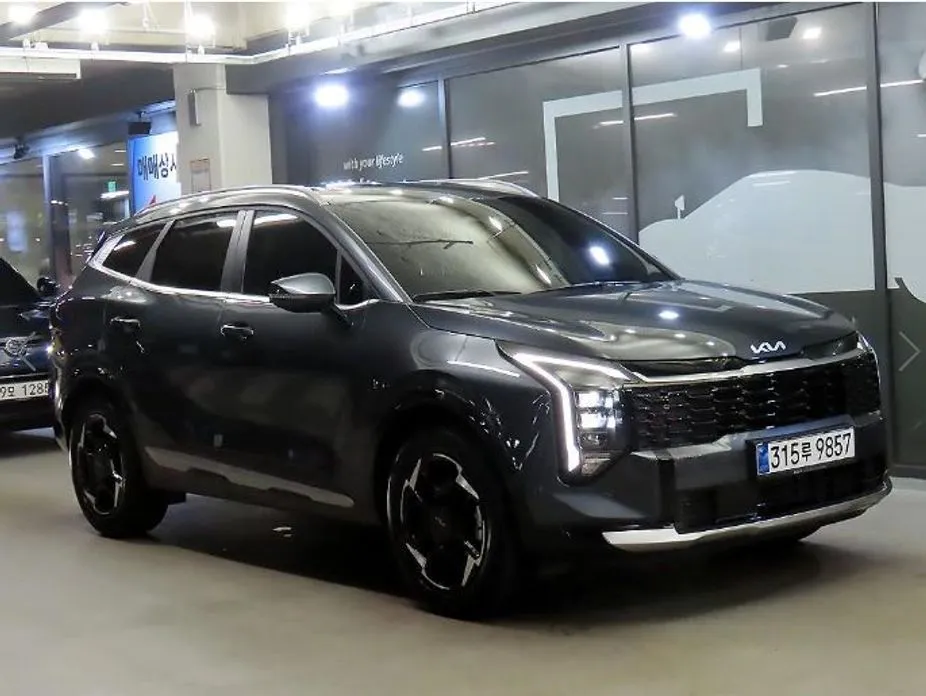 Kia Sportage — фото 1