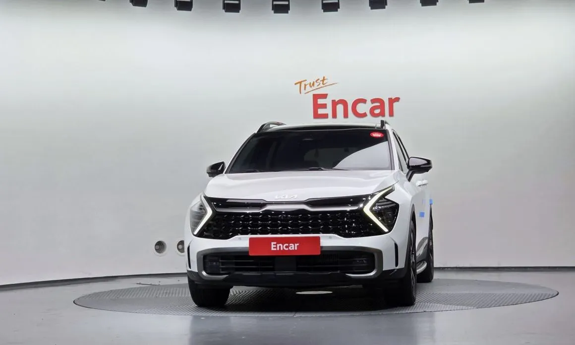 Kia Sportage — фото 1