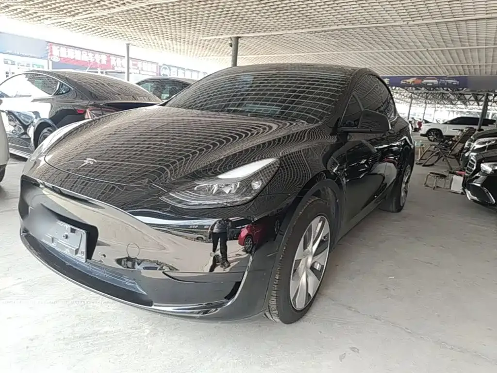 Tesla Model Y — фото 7