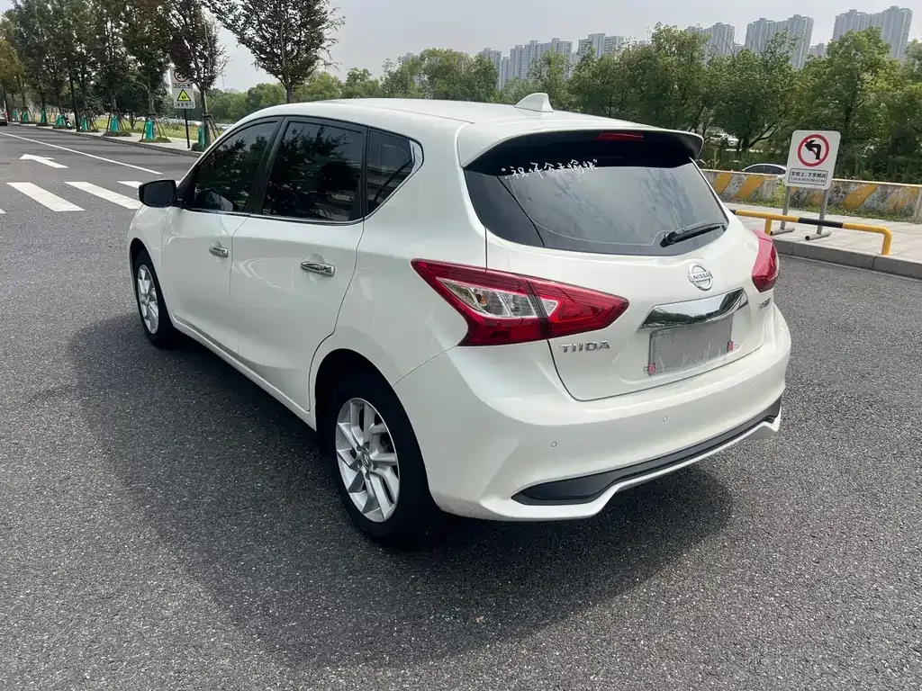 Nissan Tiida — фото 9