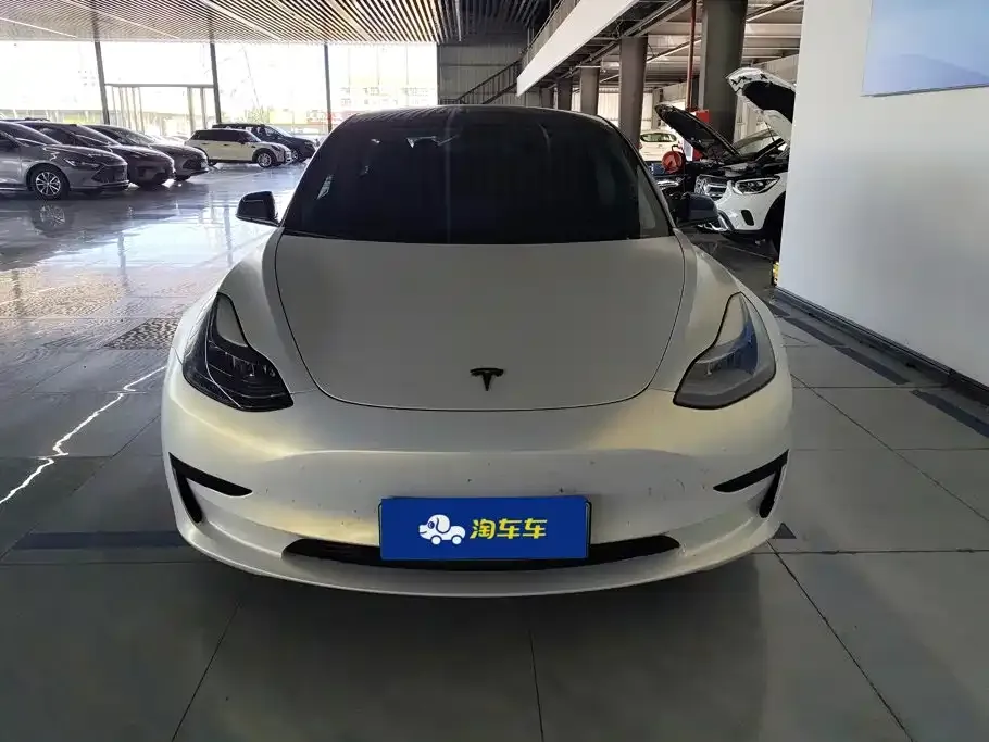 Tesla Model 3 — фото 8