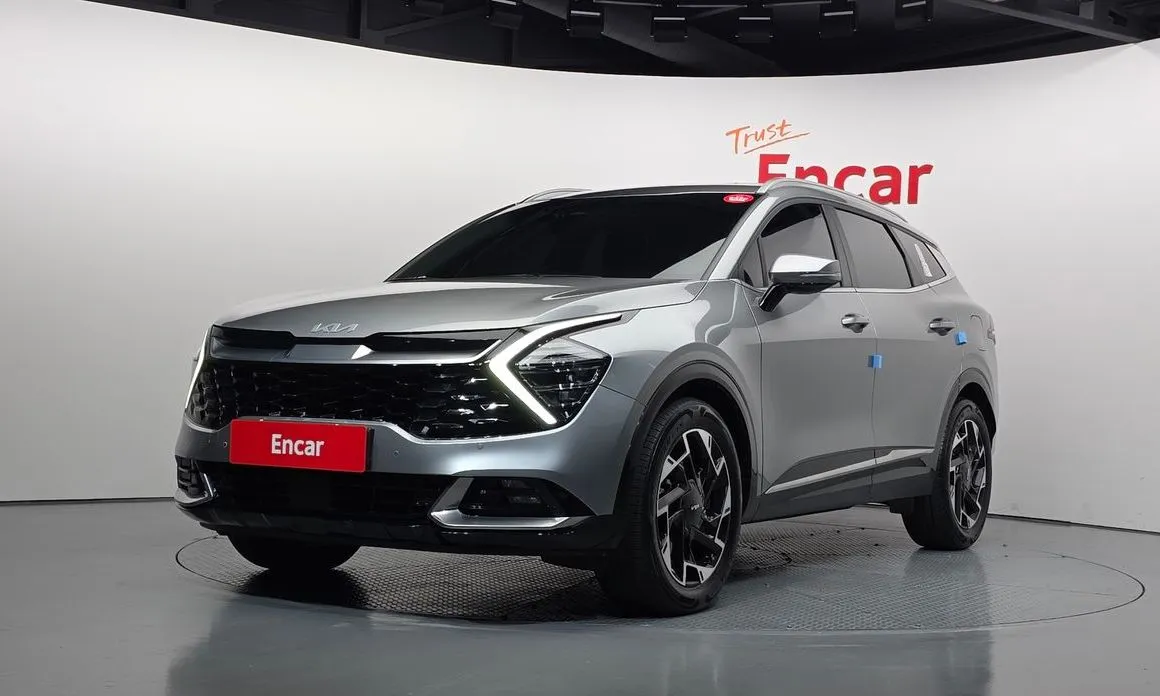 Kia Sportage — фото 1