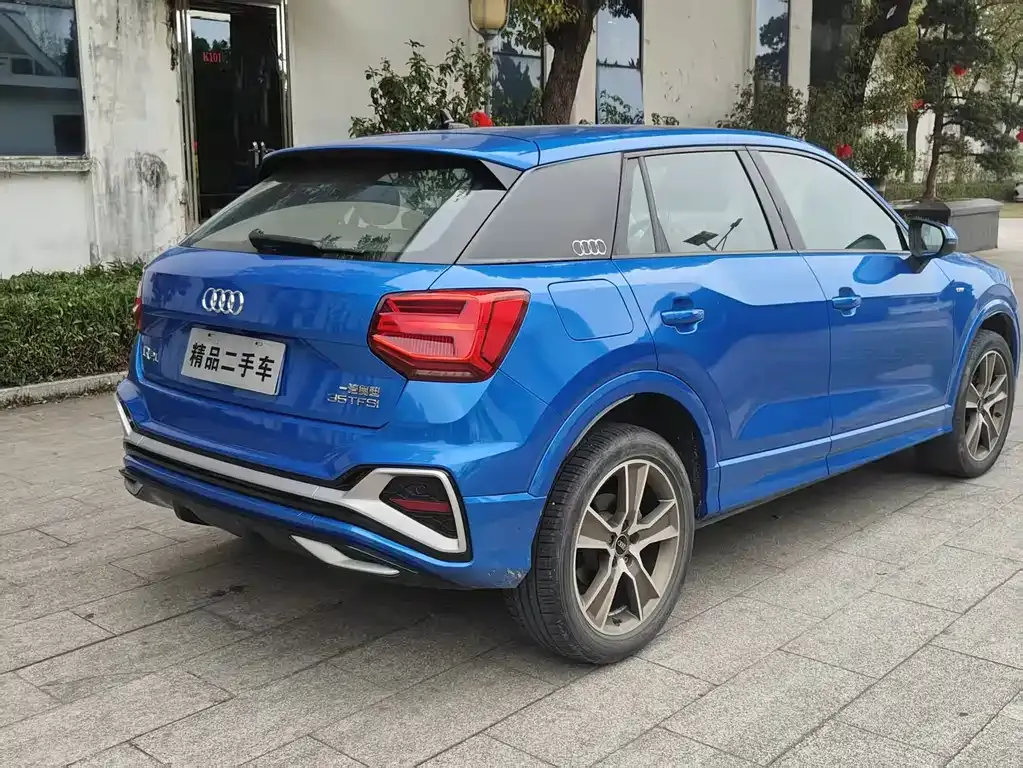 Audi Q2L — фото 7