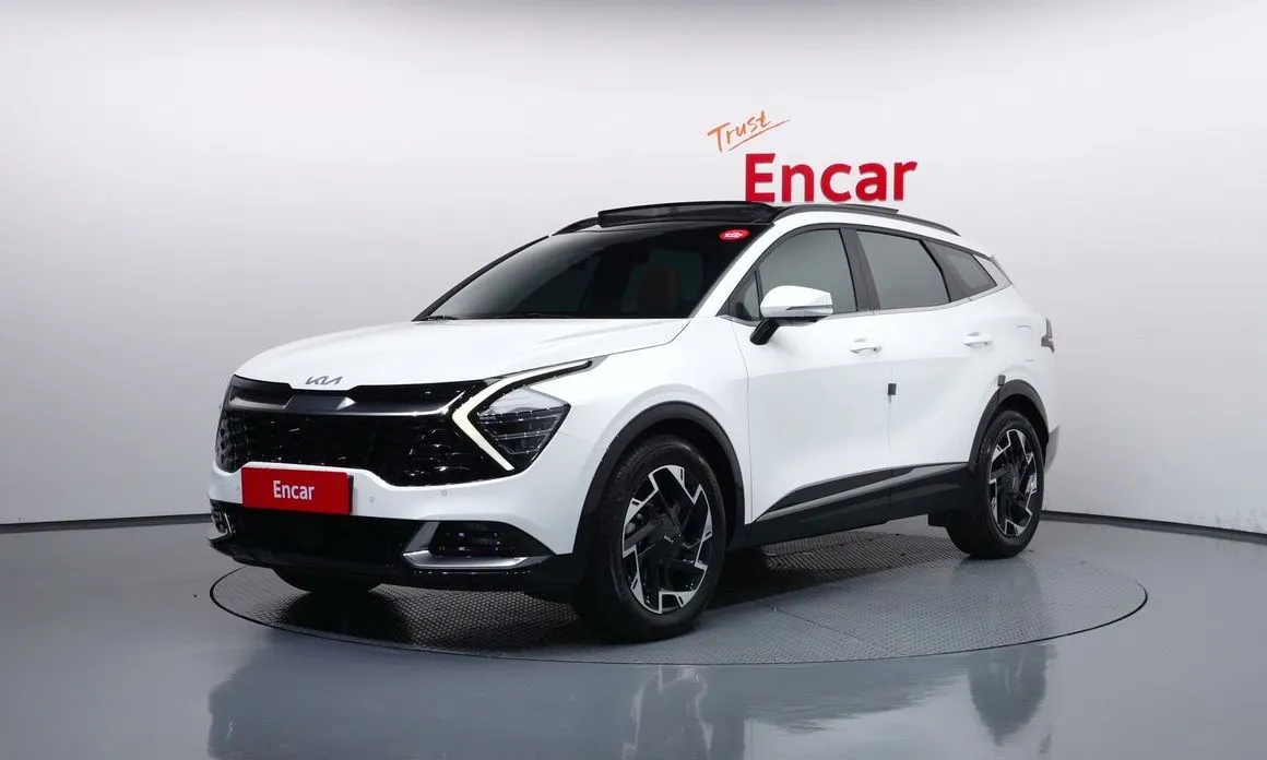 Kia Sportage — фото 1