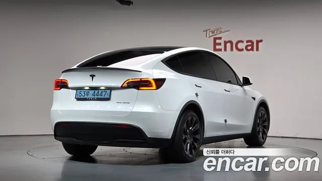 Tesla Model Y — фото 9
