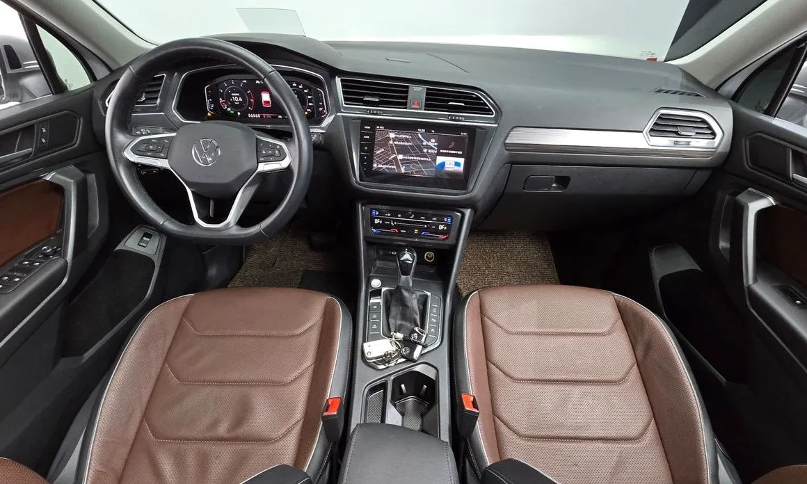 Volkswagen Tiguan — фото 8