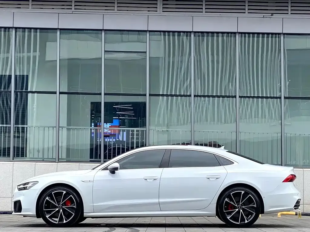 Audi A7L — фото 7