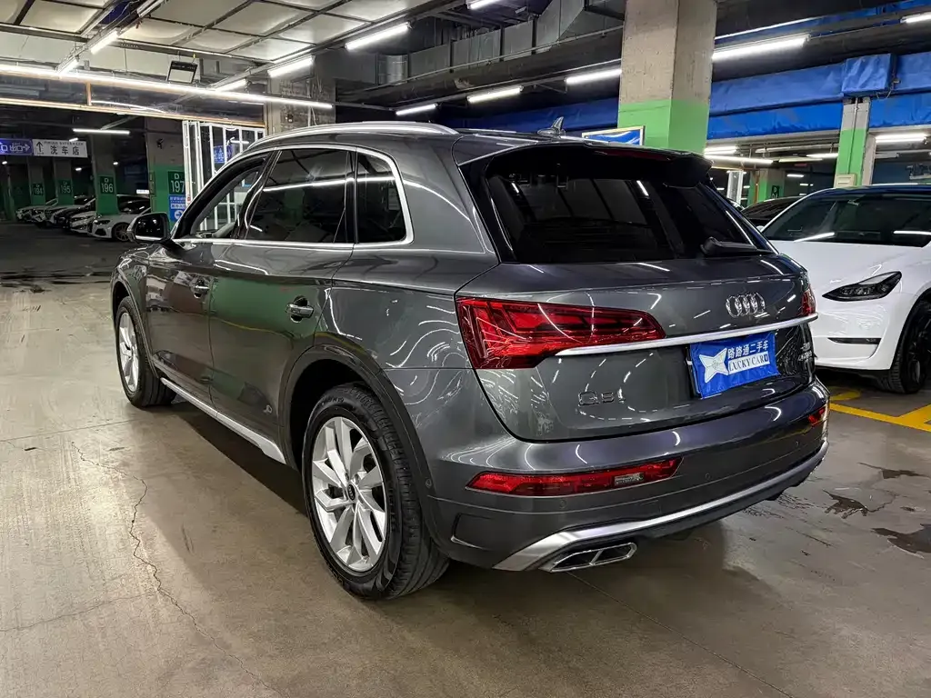 Audi Q5L — фото 10