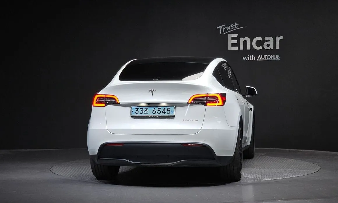 Tesla Model Y — фото 10