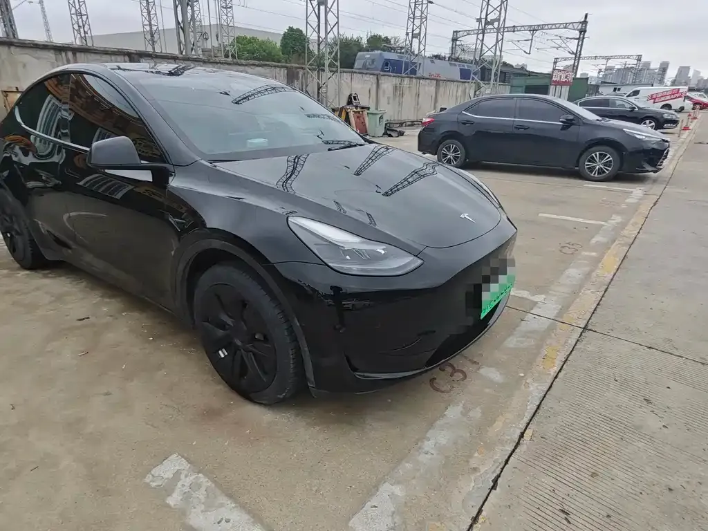 Tesla Model Y — фото 5