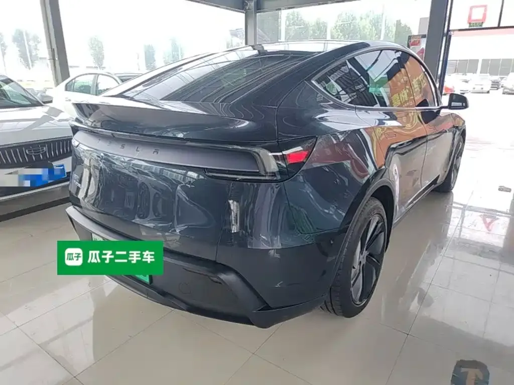 Tesla Model Y — фото 6