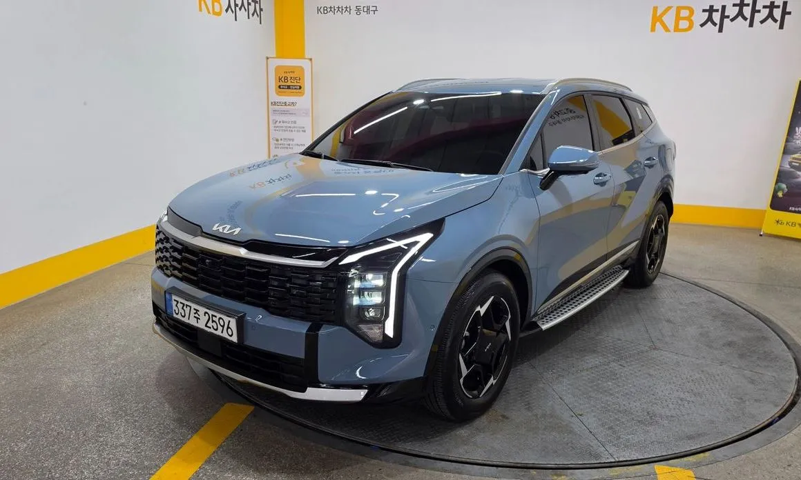 Kia Sportage — фото 1