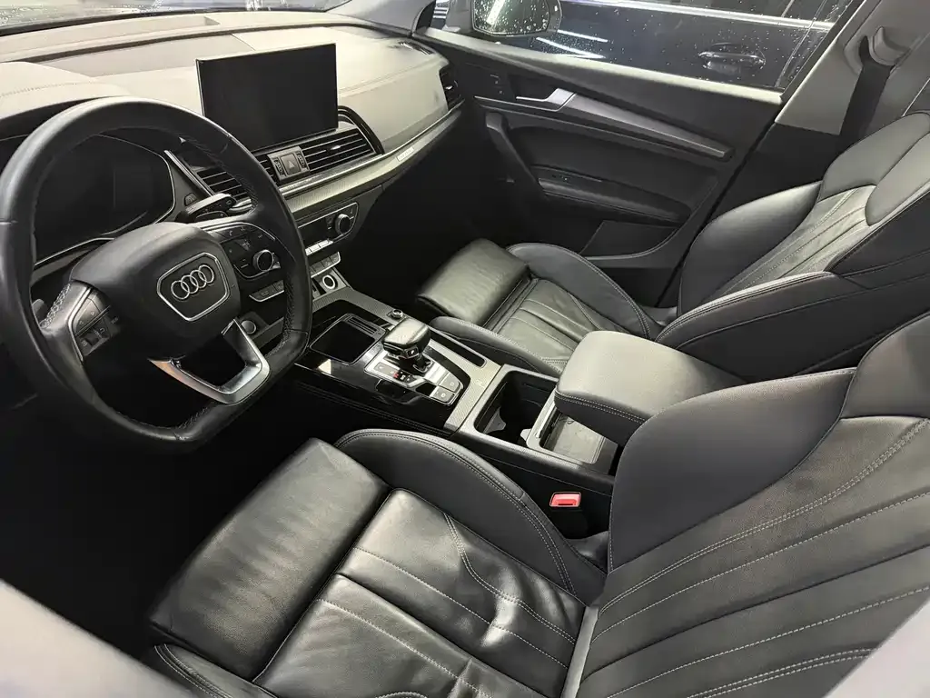 Audi Q5L — фото 10