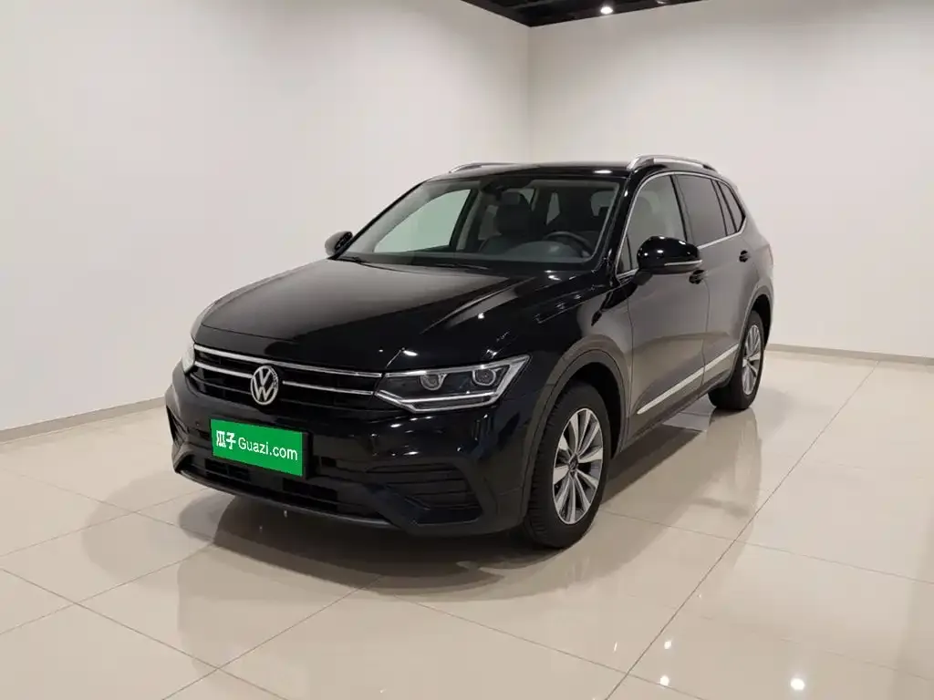 Volkswagen Tiguan L — фото 1