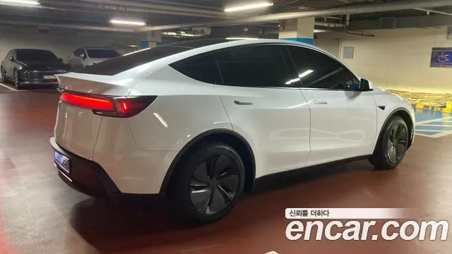 Tesla Model Y — фото 7