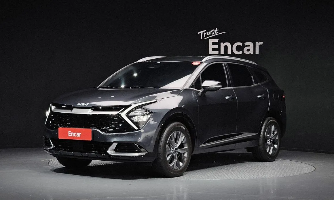 Kia Sportage — фото 1