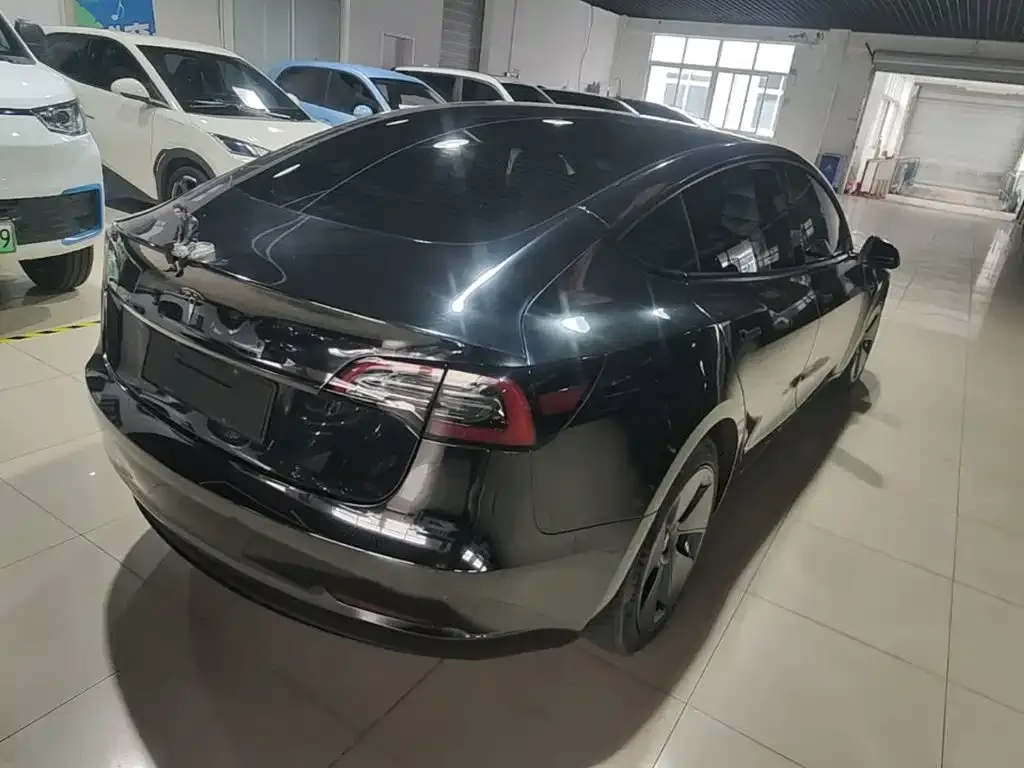Tesla Model 3 — фото 6