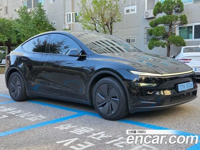 Tesla Model Y — фото 6
