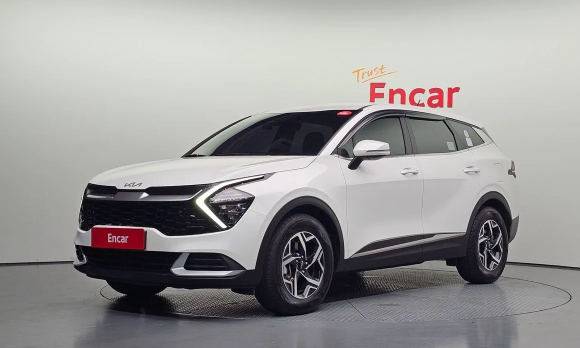 Kia Sportage — фото 1