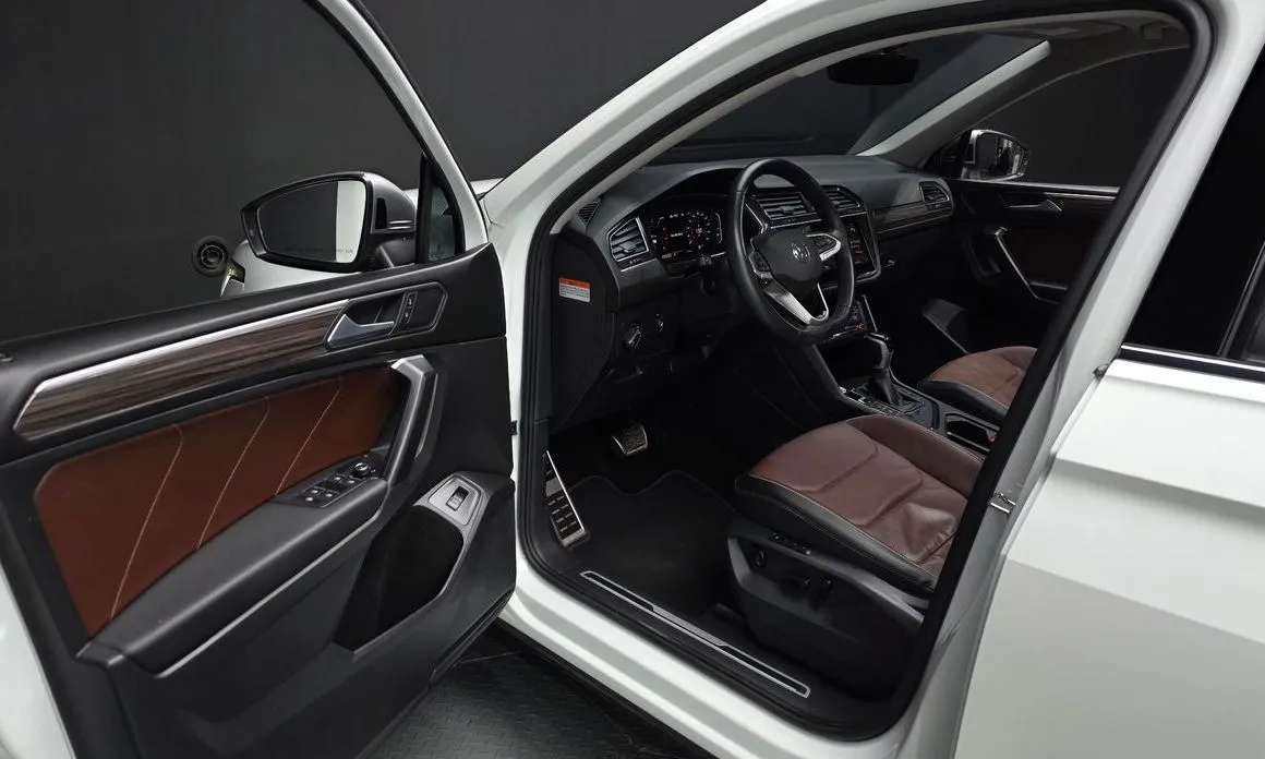 Volkswagen Tiguan — фото 6