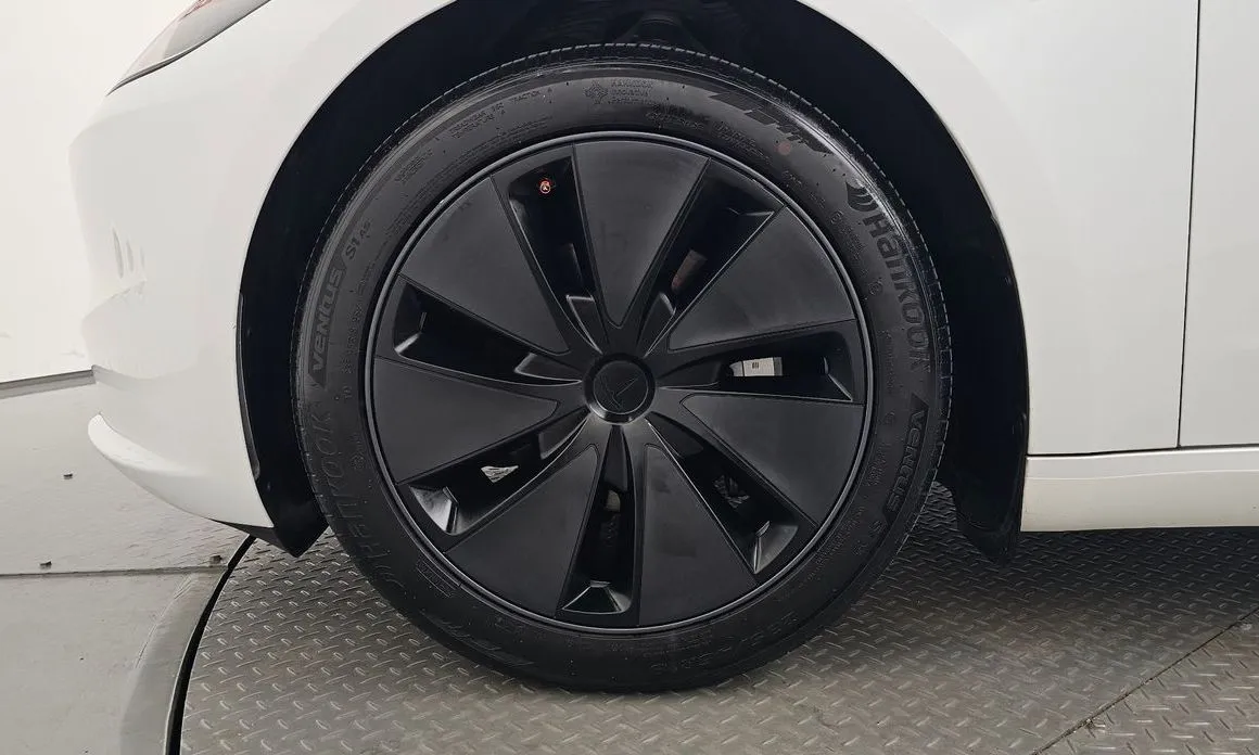 Tesla Model 3 — фото 7