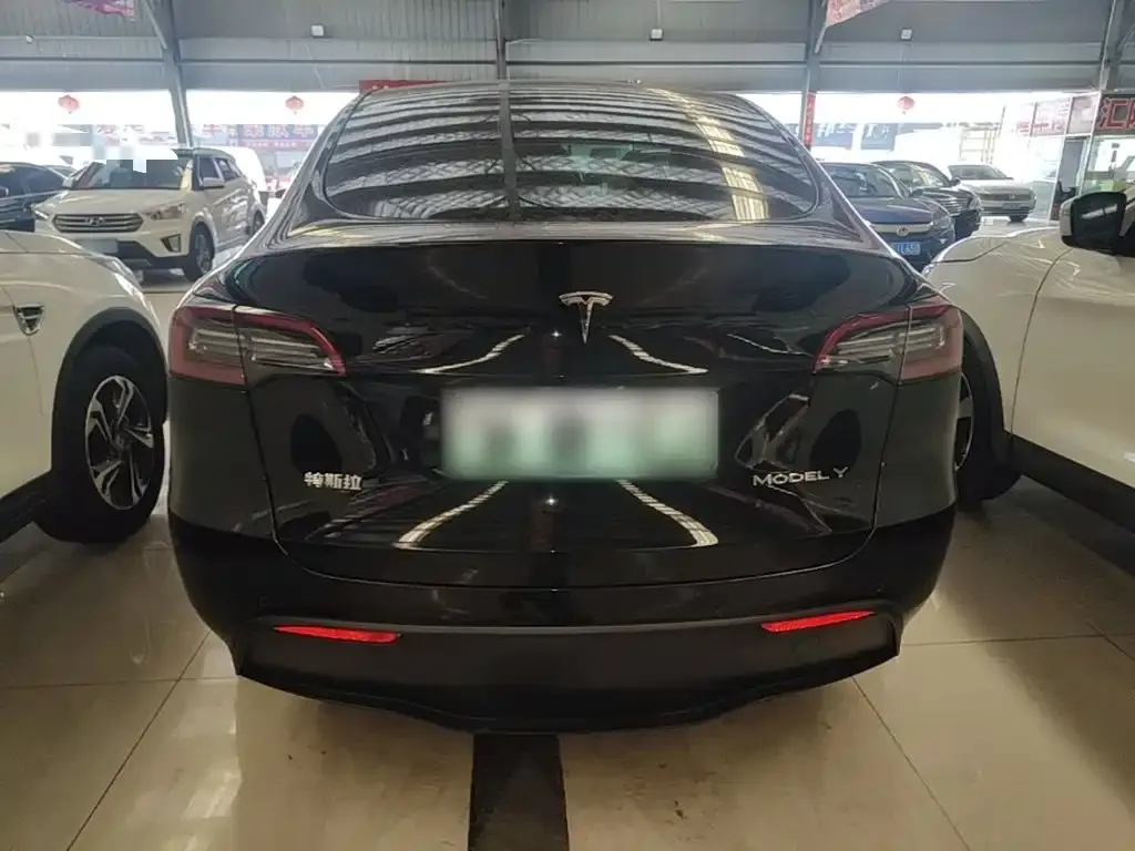 Tesla Model Y — фото 7