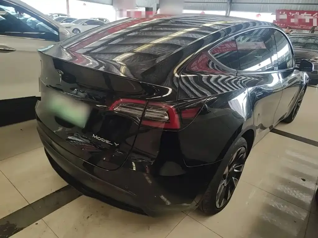 Tesla Model Y — фото 6