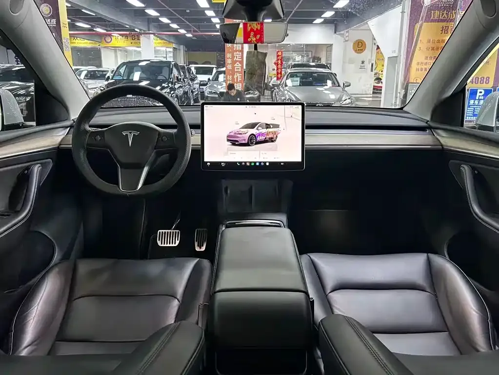 Tesla Model Y — фото 6
