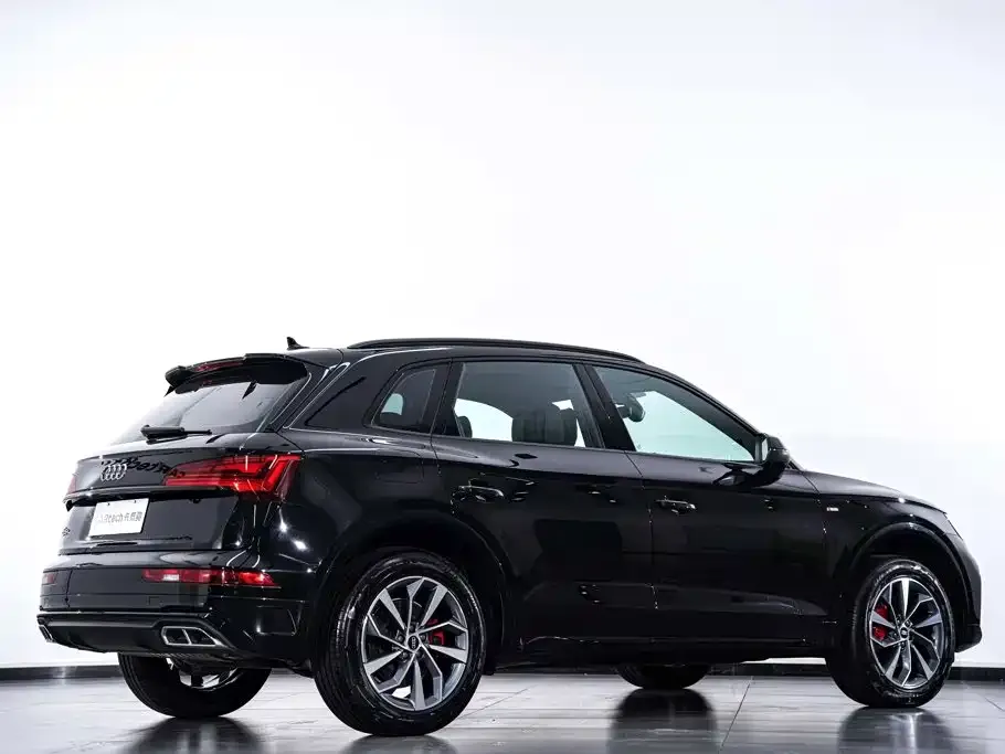 Audi Q5L — фото 6