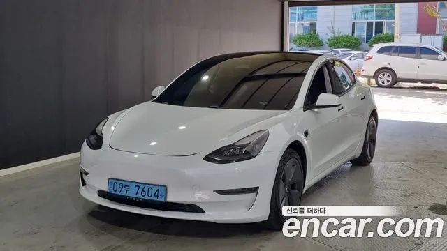 Tesla Model 3 — фото 10