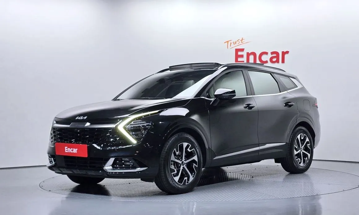 Kia Sportage — фото 1