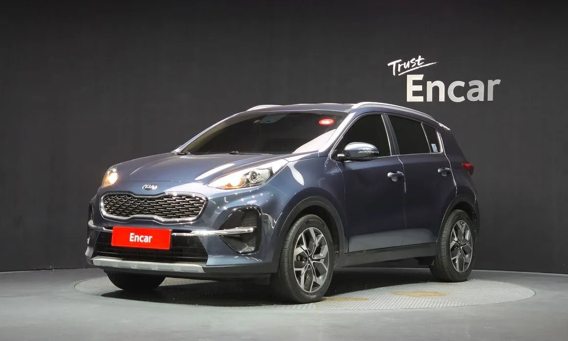 Kia Sportage — фото 1