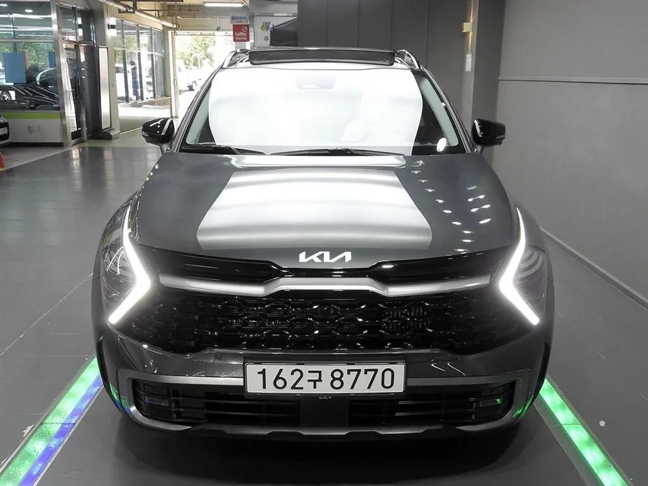 Kia Sportage — фото 1