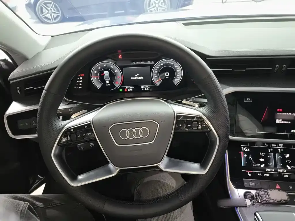 Audi A7L — фото 7