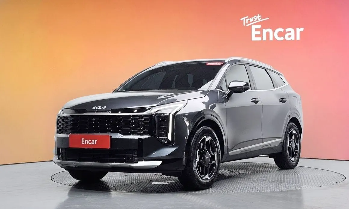 Kia Sportage — фото 1