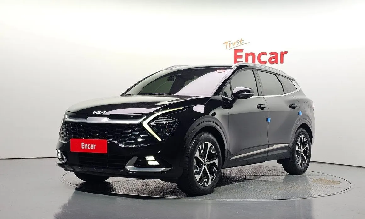 Kia Sportage — фото 1