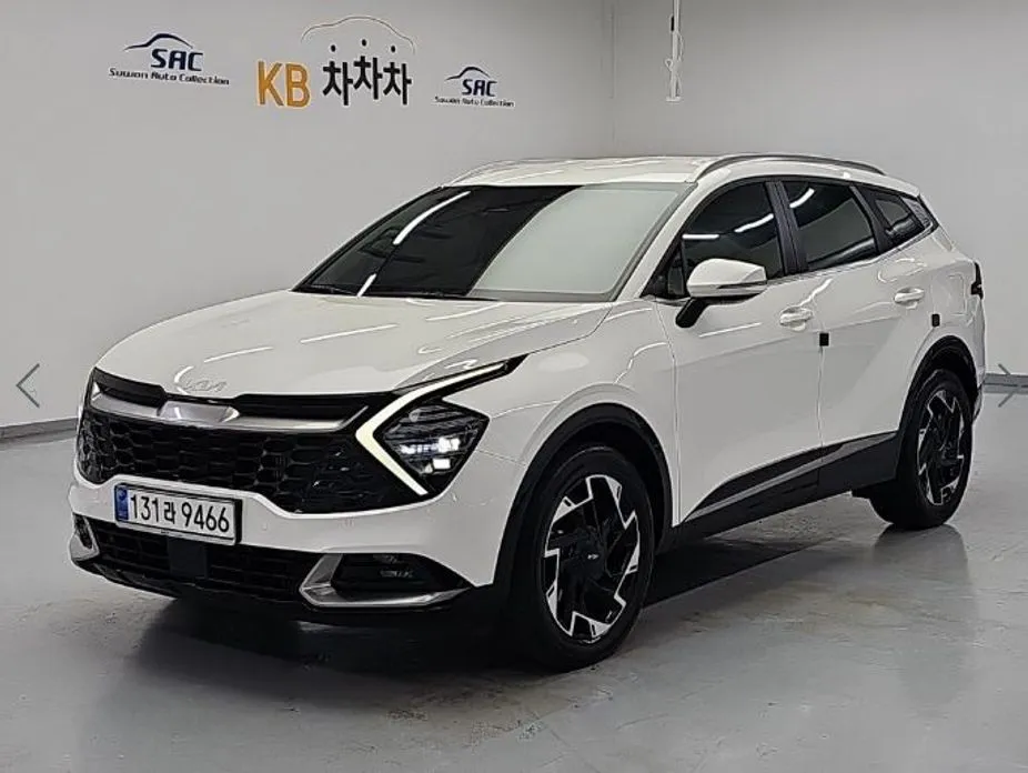 Kia Sportage — фото 1