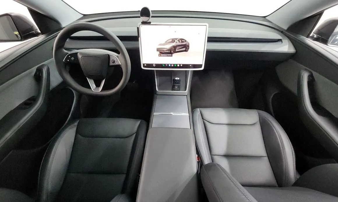 Tesla Model Y — фото 7