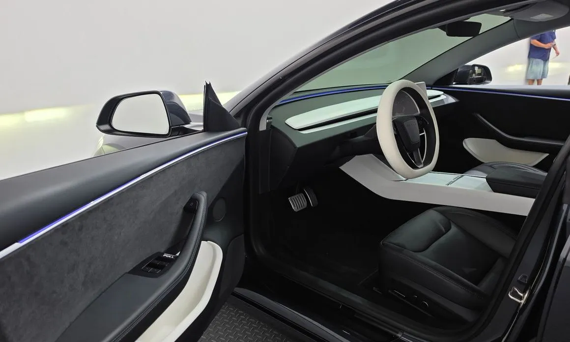 Tesla Model 3 — фото 6