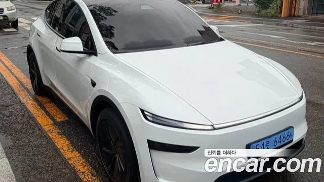 Tesla Model Y — фото 6