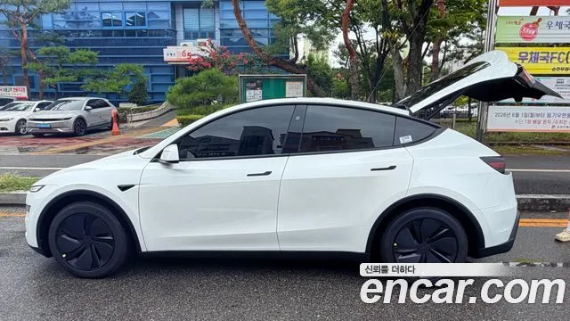 Tesla Model Y — фото 9