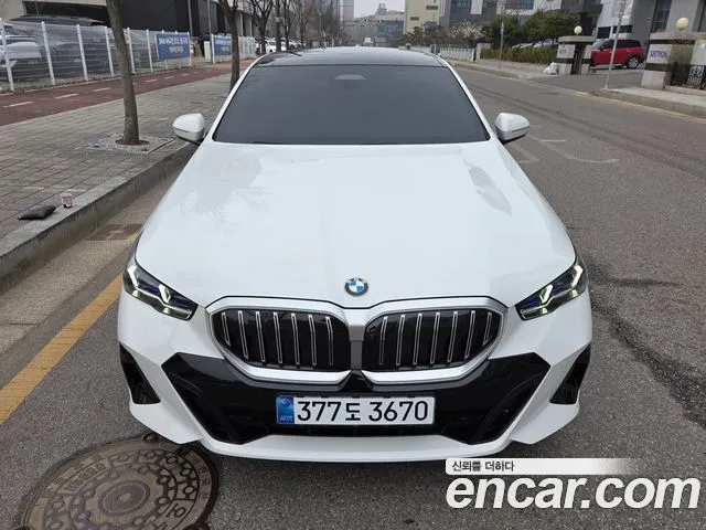 BMW 5-Series — фото 1