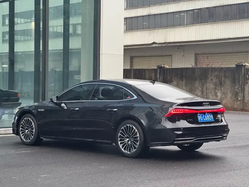 Audi A7L — фото 8