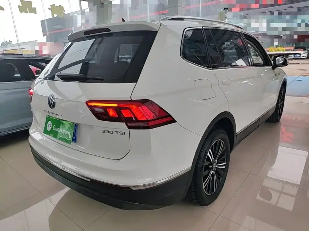 Volkswagen Tiguan L — фото 4
