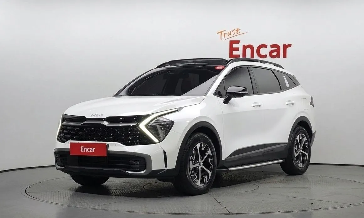 Kia Sportage — фото 1
